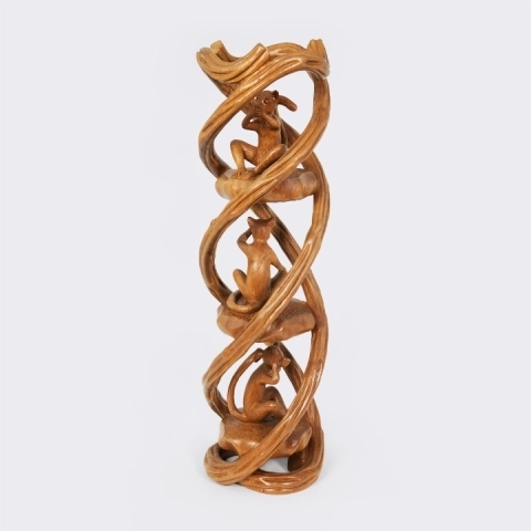 Intricate vertical wood carving featuring the Three Wise Monkeys motif interlaced with a spiral vine, handcrafted from solid exotic wood.