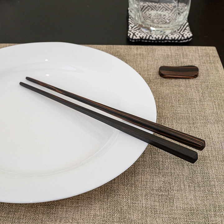 Image showcasing the chopstick in use.