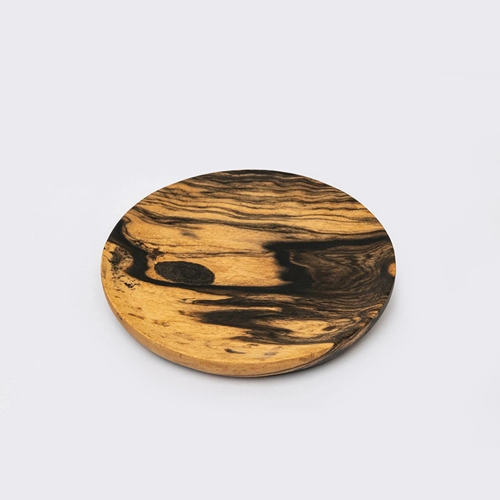 Rotating view highlighting the round coaster's features.