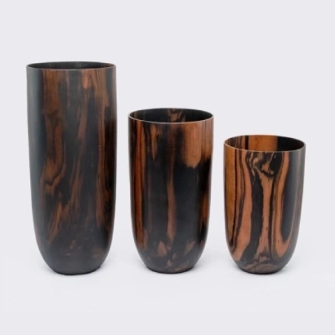 Studio shot featuring a set of vase