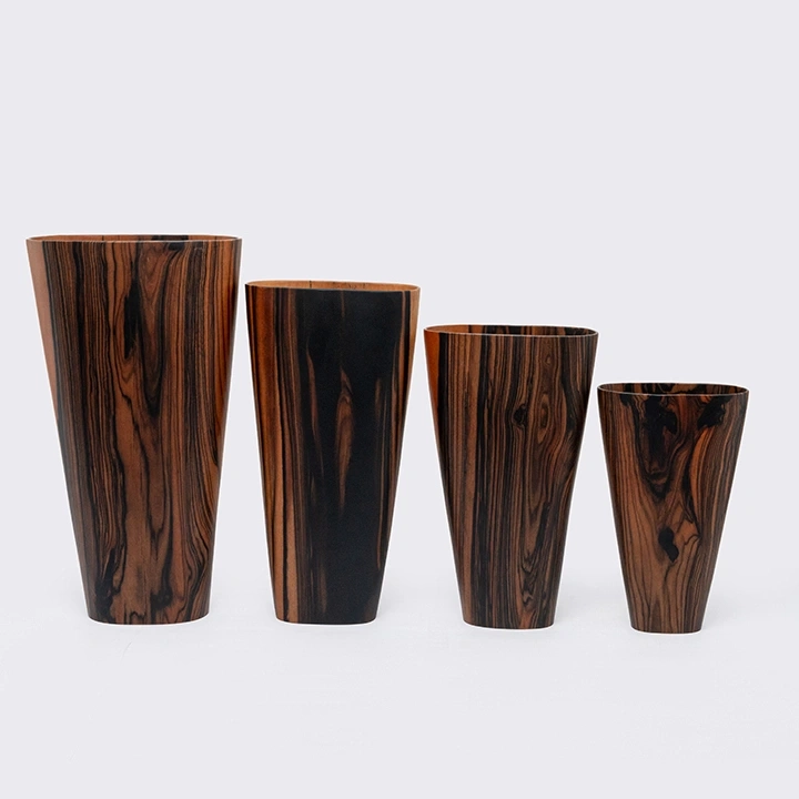 Studio shot featuring a set of vases