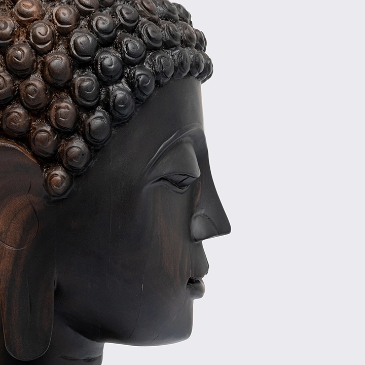 Detail Picture of the Buddha Head Short Haircut on Pedestal