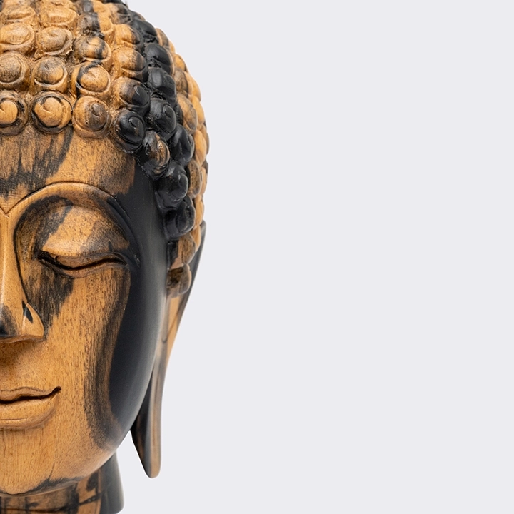 Detail Picture of the Buddha Head Short Haircut on Pedestal