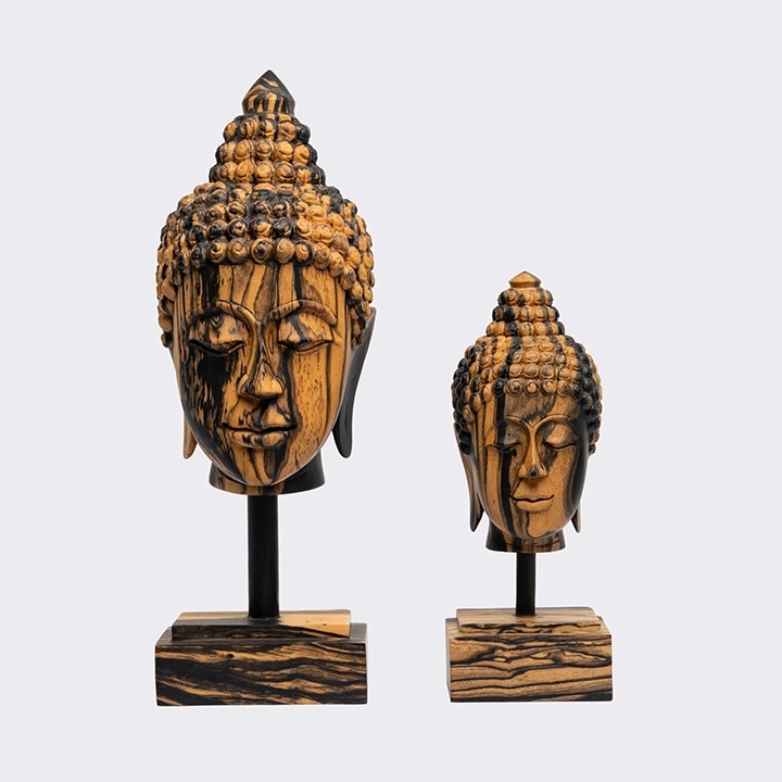 Studio picture of the Buddha Head Short Haircut on Pedestal