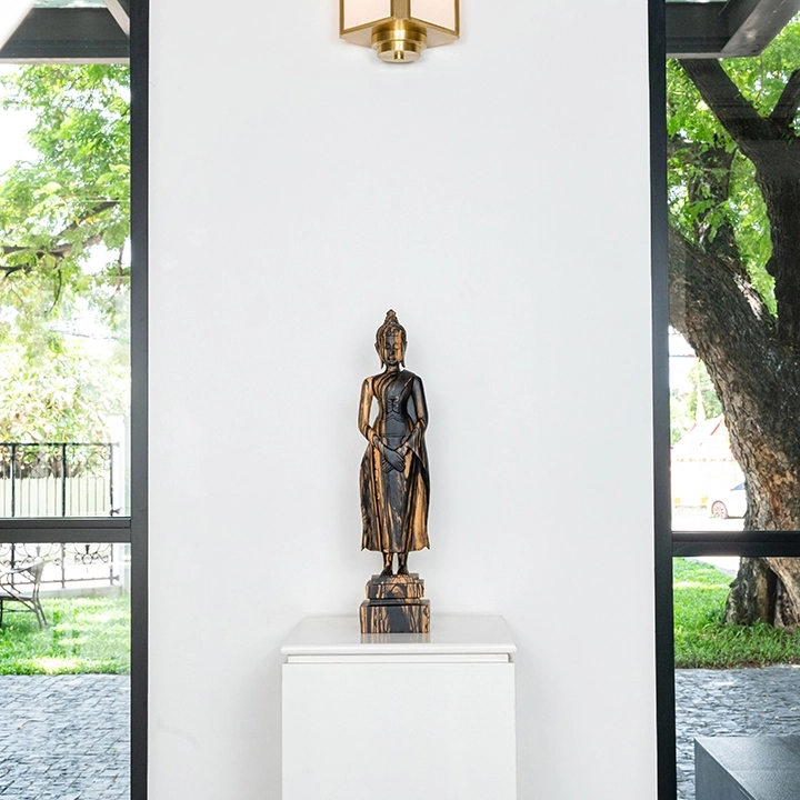 Picture in situ of the Standing Buddha Hands Down Crossed