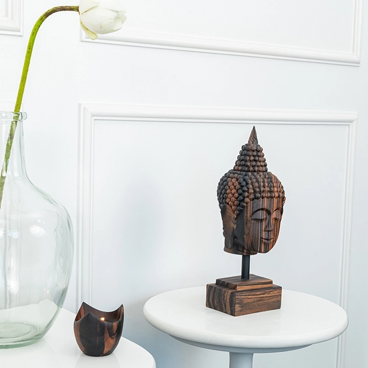 Image showcasing the Buddha head in use.