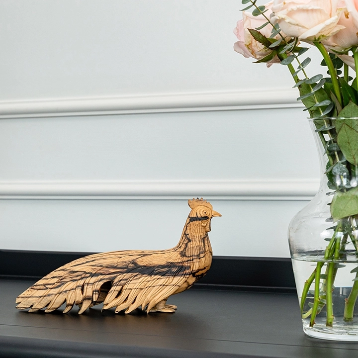 image showcasing the peacock sculpture in use