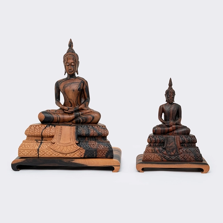 Rotating view highlighting the buddha sculpture's features.