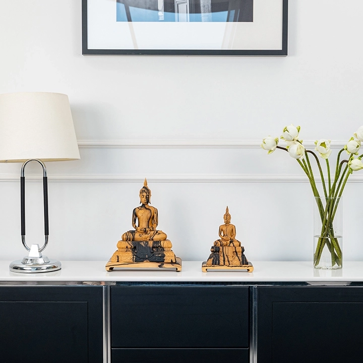 Rotating view highlighting the buddha sculpture's features.