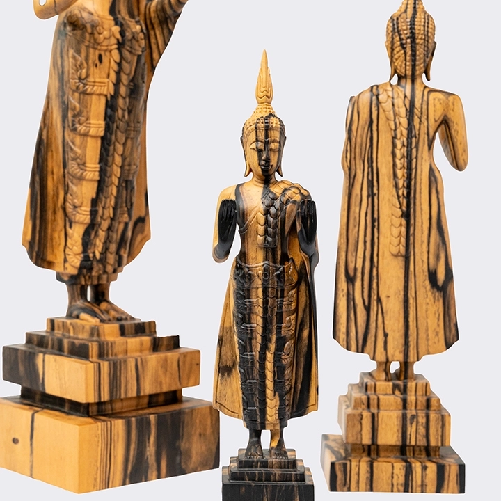 Rotating view highlighting the buddha sculpture's features.