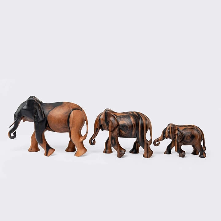 Studio shot featuring a set of Elephant sculpture.