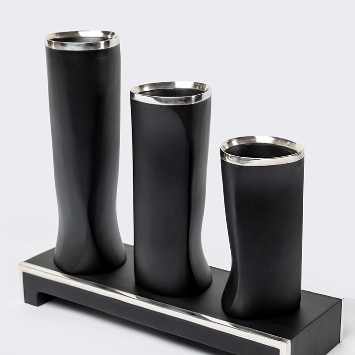 Studio shot featuring a set of vases.