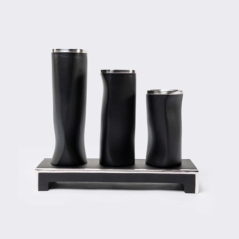 Studio shot featuring a set of vases