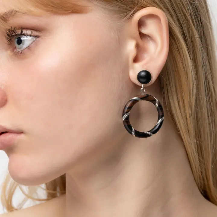 Image showcasing the earrings in use 